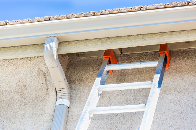 ladder up ready to clean gutters